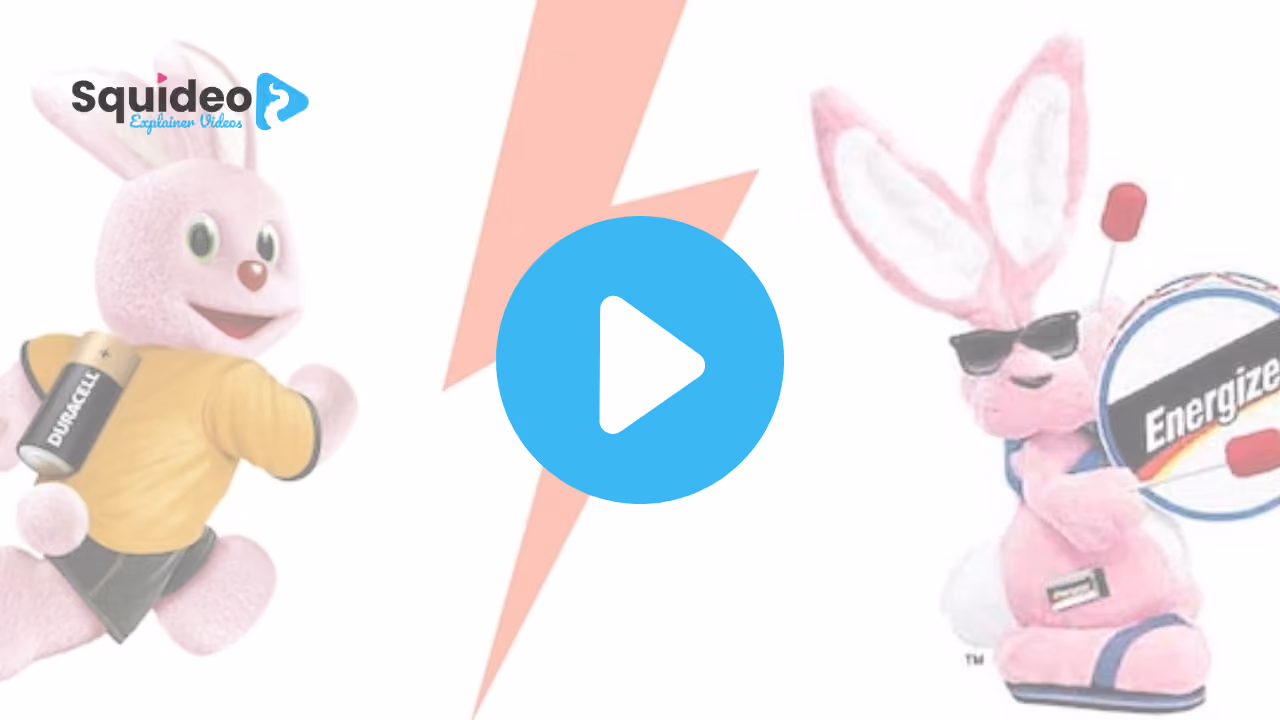 The pink Duracell Bunny in a yellow t-shirt carrying a Duracell battery, facing the Energizer Bunny in sunglasses with its bass drum, the two split by a lightning bolt