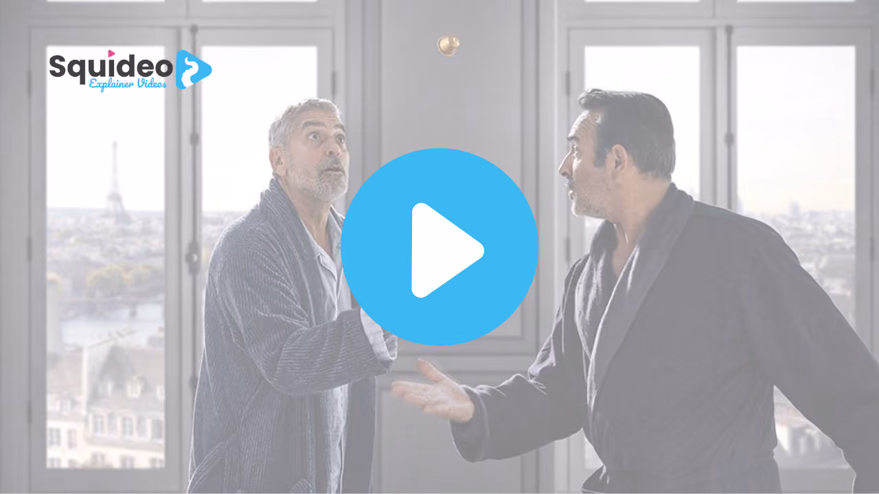 George Clooney and another man, both in dressing gowns, mid-argument in a Paris apartment with the Eiffel Tower through the window