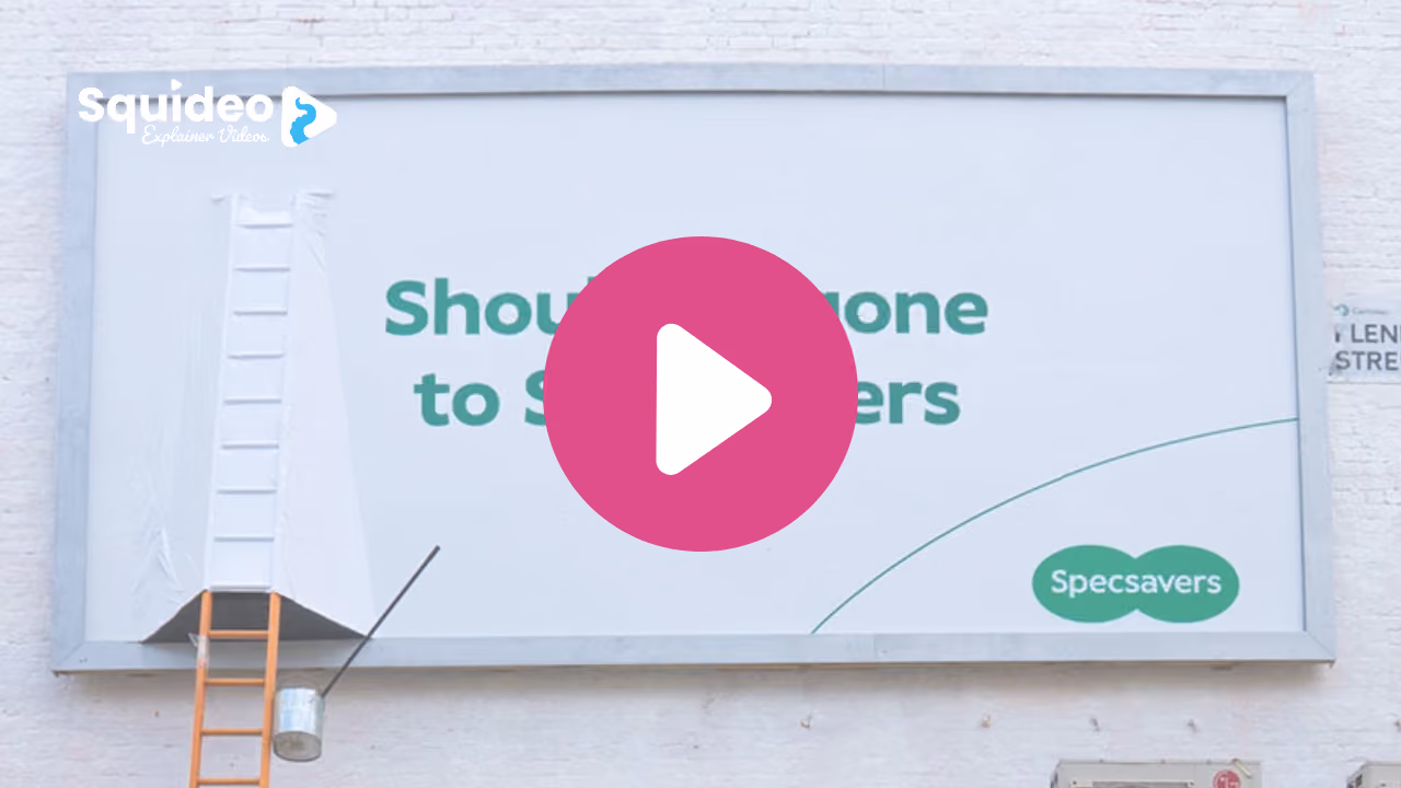 A billboard on a white brick wall reading 'Should've gone to Specsavers', a ladder and a paint kettle propped against it and a strip of the poster hanging loose