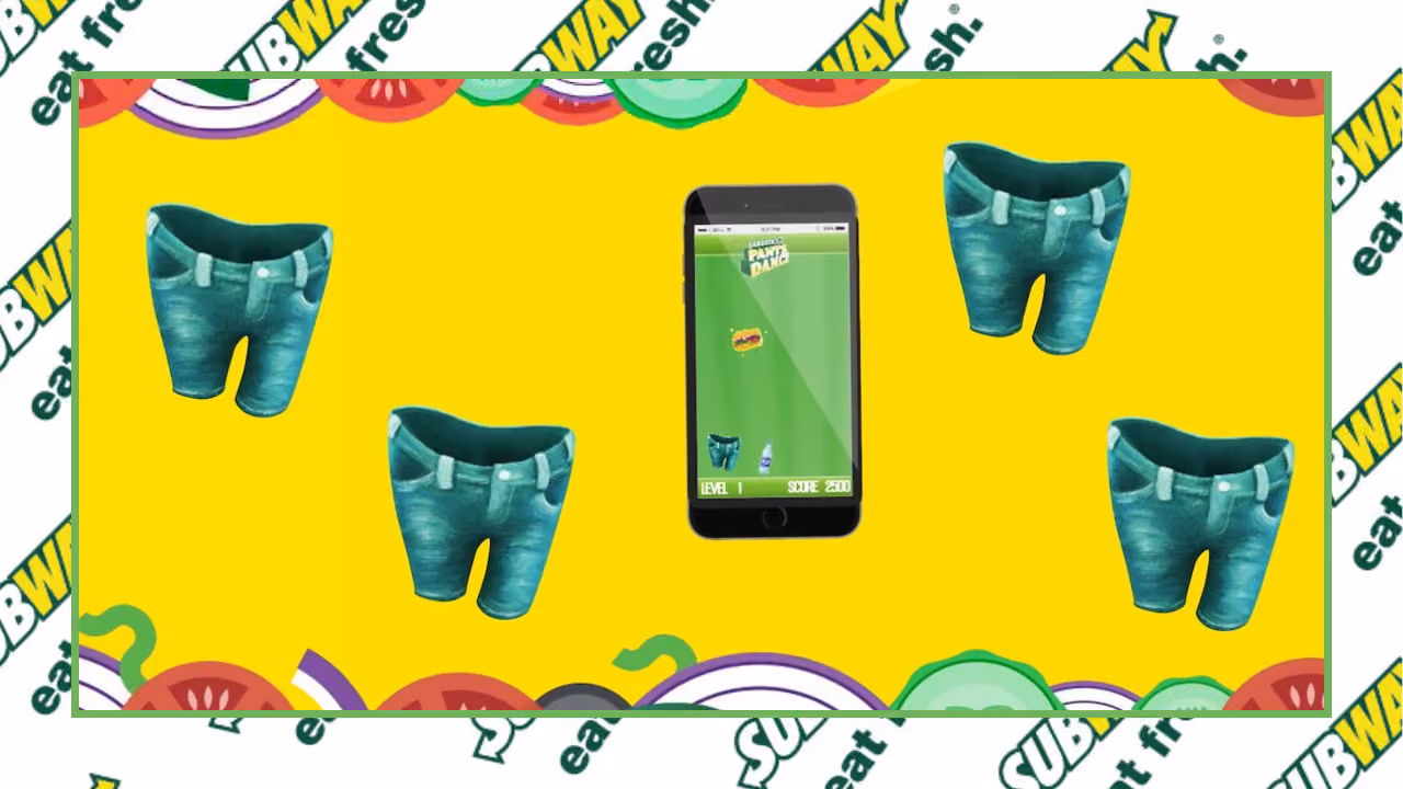 A Subway mobile game promo: a phone showing Pants Dance, level 1, score 2500, surrounded by cut-out pairs of denim shorts on yellow, framed by the Subway 'eat fresh' logo and salad-slice artwork